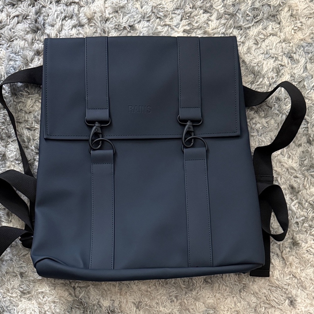 Rains Navy Blue Roll-Top Backpack, washable , good size for travel